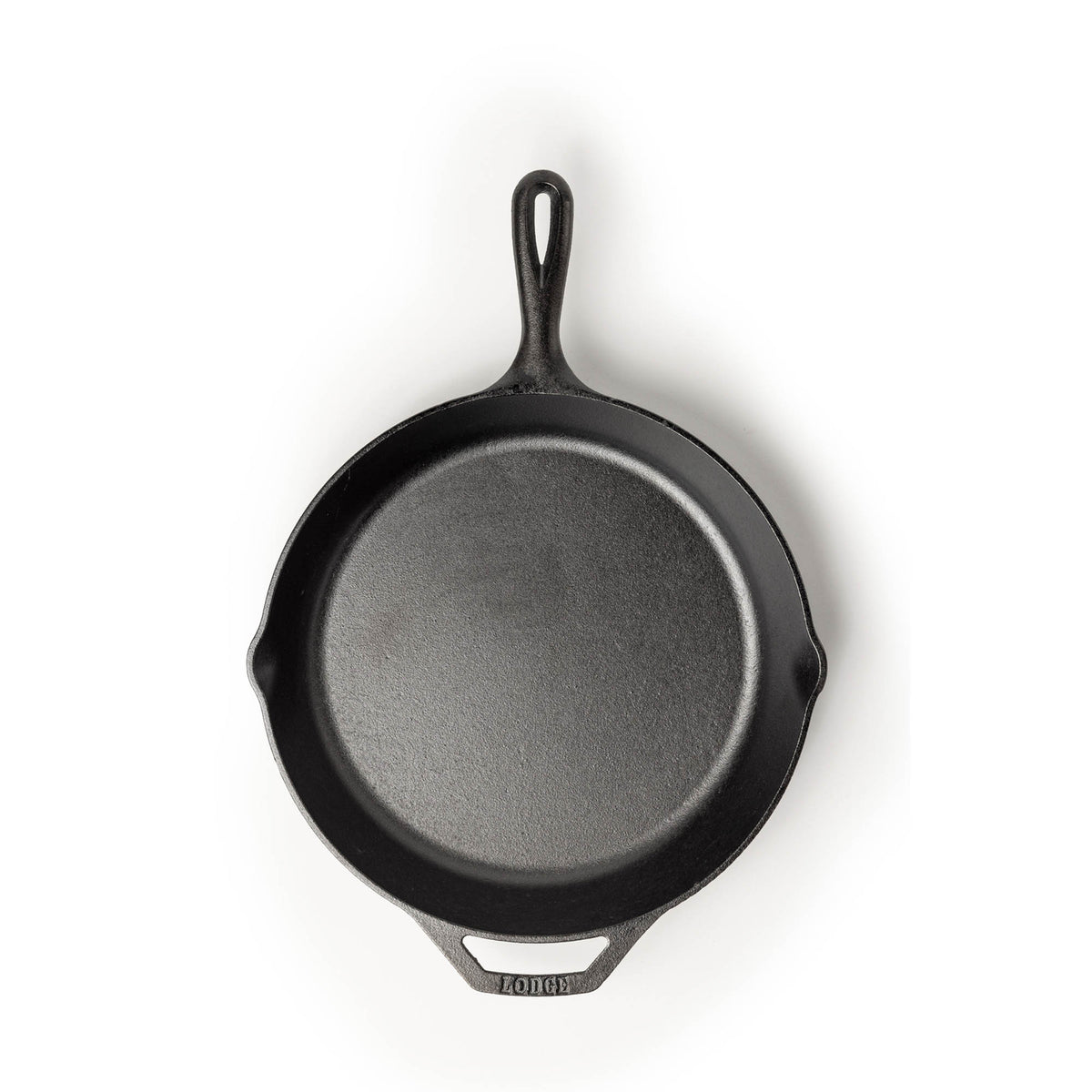 Lodge Classic cast iron skillet in black with sturdy handle, suitable for frying and searing cooking tasks.