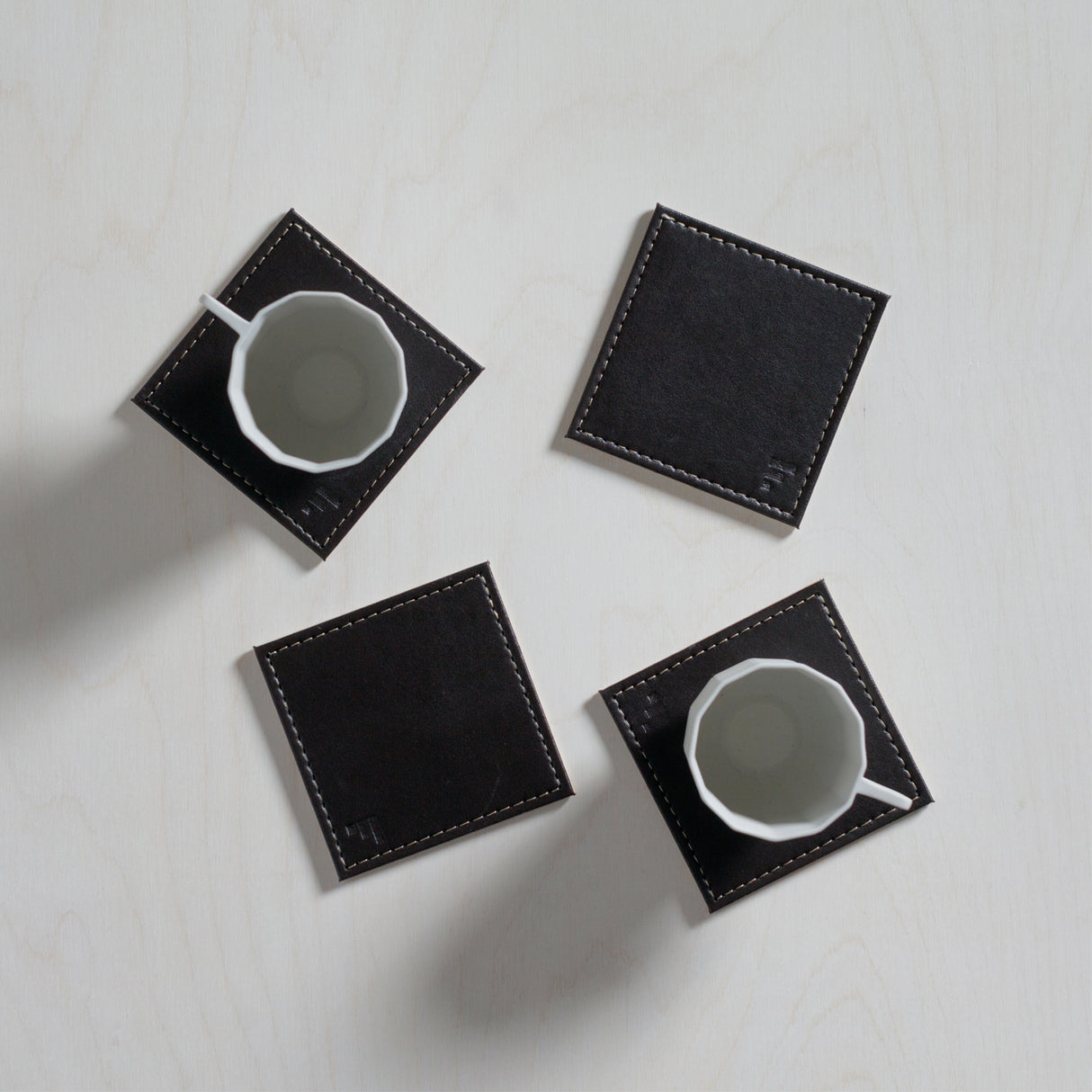 Untersetzer grau/schwarz, Kunstleder