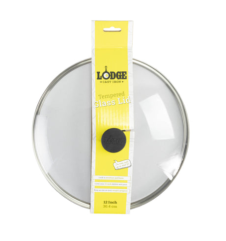 Black Lodge skillet lid showing a round, black metal cover with handle, designed for use with Lodge cookware.