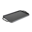 Lodge 2-sided grill plate with smooth and ridged surfaces, 50.8 cm x 25.4 cm, designed for versatile outdoor cooking.