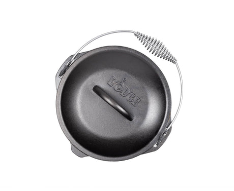 Lodge classic black Dutch oven with a sturdy lid, cast iron construction, suitable for stovetop and oven cooking.