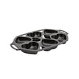 Lodge classic black 6-heart cake pan for baking, made of durable material, ideal for creating shaped desserts and cakes.