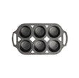 Lodge classic black muffin pan with multiple muffin cups, non-stick baking mold for muffins and cupcakes.