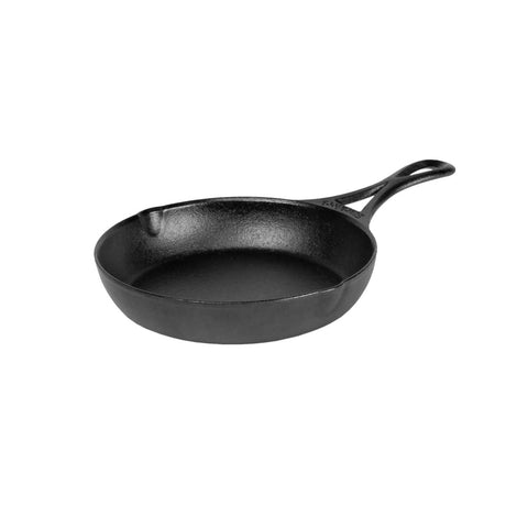 Lodge black cast iron skillet pan with 18 cm diameter, sturdy handle, suitable for stovetop cooking and frying.