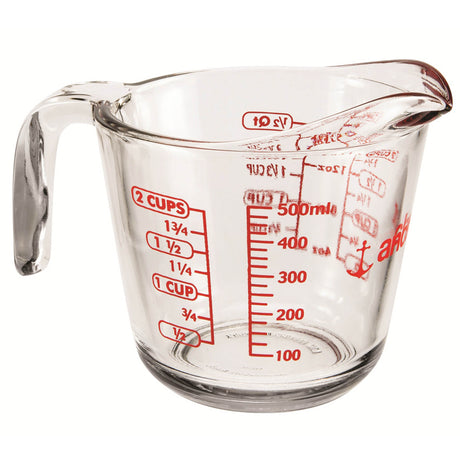 Anchor Hocking glass measuring cup with clear measurement markings and a sturdy handle for precise liquid measurement.