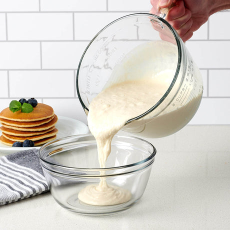 Anchor Hocking 2L measuring cup with clear glass body and measurement markings for precise liquid measurement.