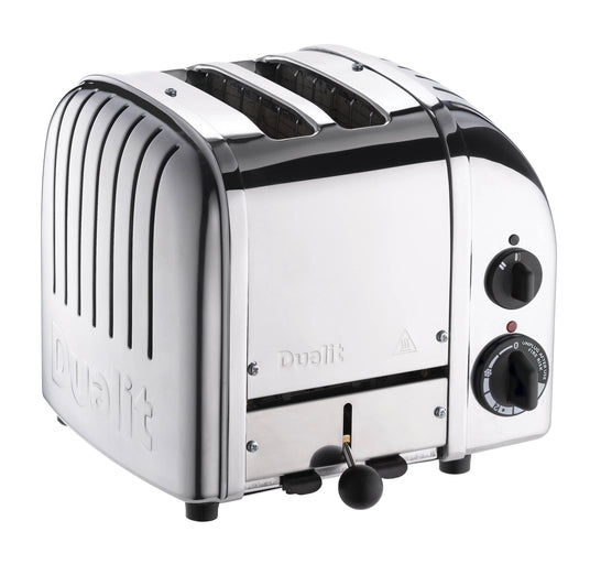 Dualit Newgen polished 2-slice toaster with modern design and stainless steel finish, showcasing bread slices inside.