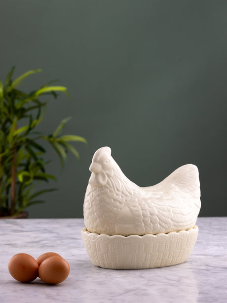 White ceramic chicken figurine by Mason Cash, detailed ceramic farm animal decor piece.