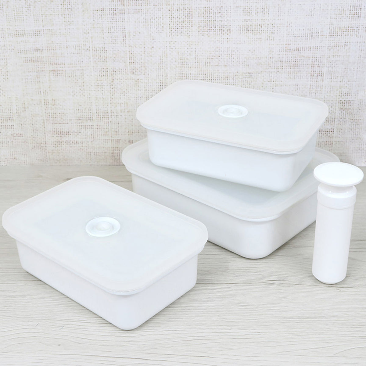 HONEYWARE white enamel storage jar with vacuum lid, 1.85L capacity, featuring a smooth, glossy surface and secure sealing.