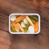 White HONEYWARE emailledosen vacuum storage container with 1.12L capacity, featuring a secure vacuum lid for freshness.