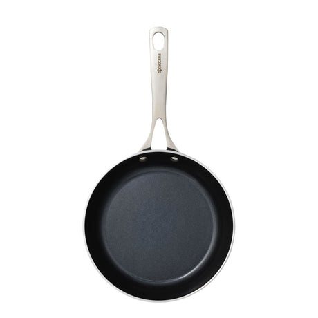Kyocera ceramic frying pan in black with a smooth non-stick surface and ergonomic handle, ideal for versatile cooking.