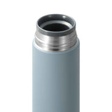 KYOCERA Slim Mug insulated bottle in blue, stainless steel design for hot and cold beverages, with a sleek, compact shape.