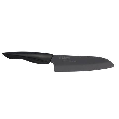 Schwarzes KYOCERA Keramikmesser SHIN mit ergonomischem Griff, ideal zum Schneiden von Obst und Gemüse.