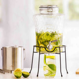 KILNER Diamond drink dispenser with clear glass body and metal spigot for serving beverages at gatherings.